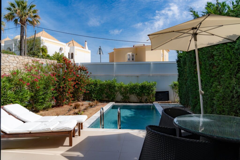 outside pool and resting area