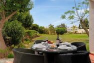 dining table outside , in the green area