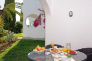 dining table outside , in the green area